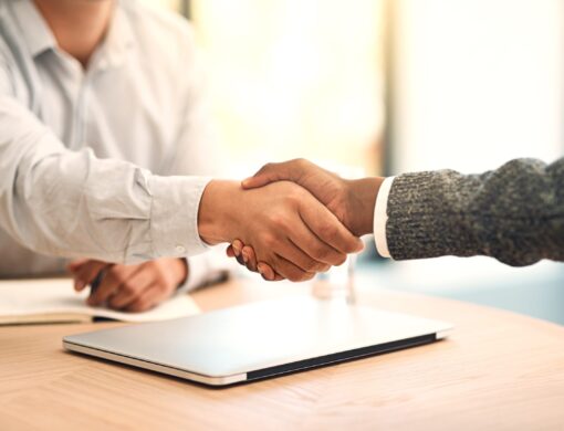 Shaking,Hands,,Agreement,And,Partnership,In,Office,With,Business,People,
